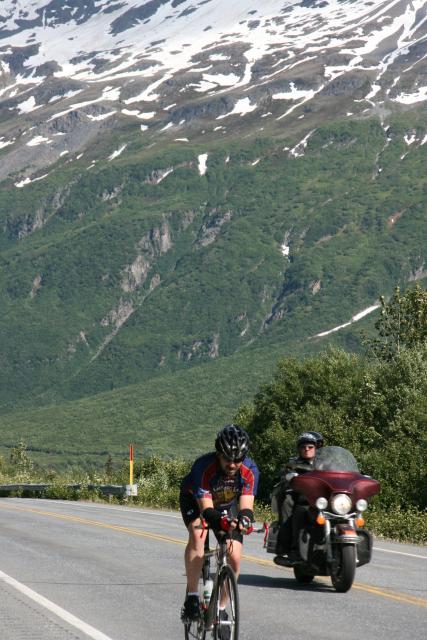 You have to wonder what this guy on the motorcycle is thinking.